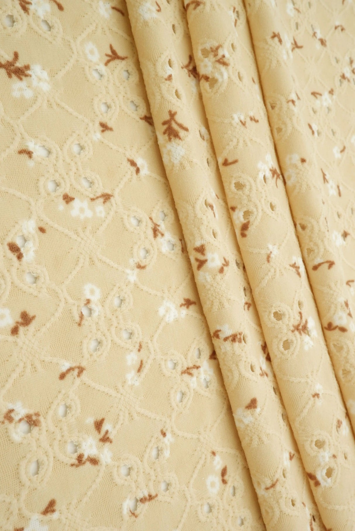 Eyelet Ditsy Floral Jacquard Knit Fabric DTY Stretch Polyester 58/60” Wide