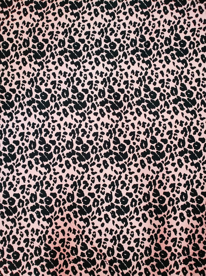 Polyester Spandex Brushed Single Span Fabric - Peach & Black Animal Print, 58" To 60" Width