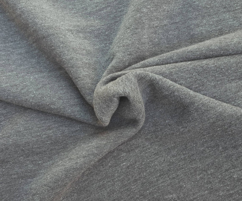 1 Yard Lt. Charcoal Gray Tri Blend French Terry Knit Fabric Offers a Soft, Breathable Texture.