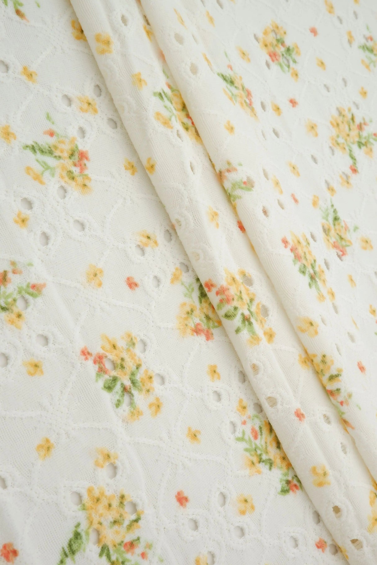 58/60" DTY Knit Jacquard Eyelet Ditsy Print Fabric Poly Spandex 190 GSM by Yard