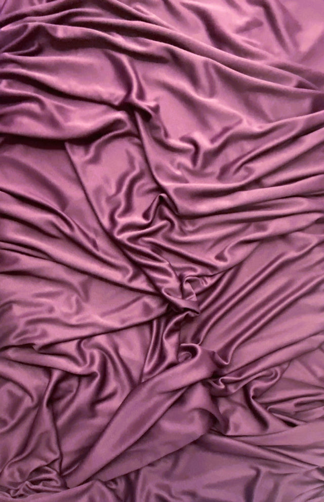 Plum stretch polyester lining fabric with a soft matte surface finish
