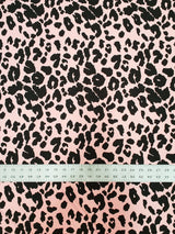 Polyester Spandex Brushed Single Span Fabric - Peach & Black Animal Print, 58" To 60" Width