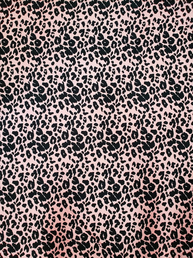 Polyester Spandex Brushed Single Span Fabric - Peach & Black Animal Print, 58" To 60" Width
